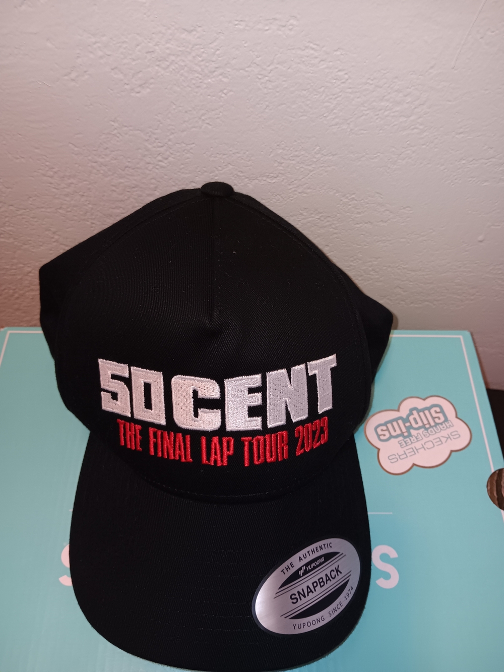 The Classic Black Snapback Hat with White and Red Embroidery